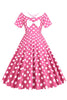 Laden Sie das Bild in den Galerie-Viewer, Rosa Polka Dots U-Boot-Ausschnitt 1950er Jahre Kleid mit Schleife