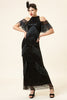 Laden Sie das Bild in den Galerie-Viewer, Glitzerndes schwarzes Perlen Langes Gatsby Kleid aus den 1920er Jahren mit Fransen