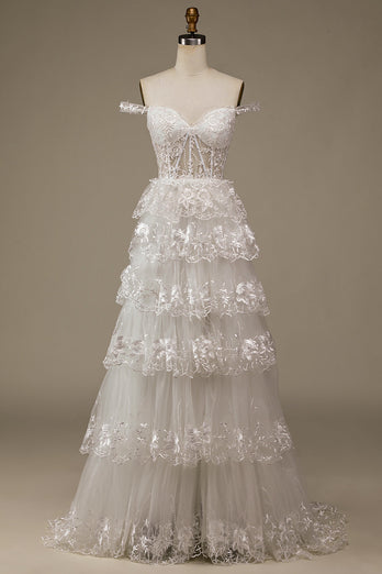 Glitzerndes weißes Brautkleid aus gestufter Spitze mit Schlitz