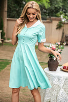 Laden Sie das Bild in den Galerie-Viewer, V-Ausschnitt 1950er Jahre Swing Kleid